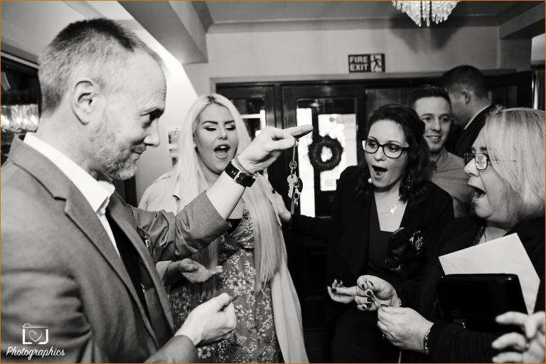 Magician in Woking performs close-up-magic with borrowed car keys